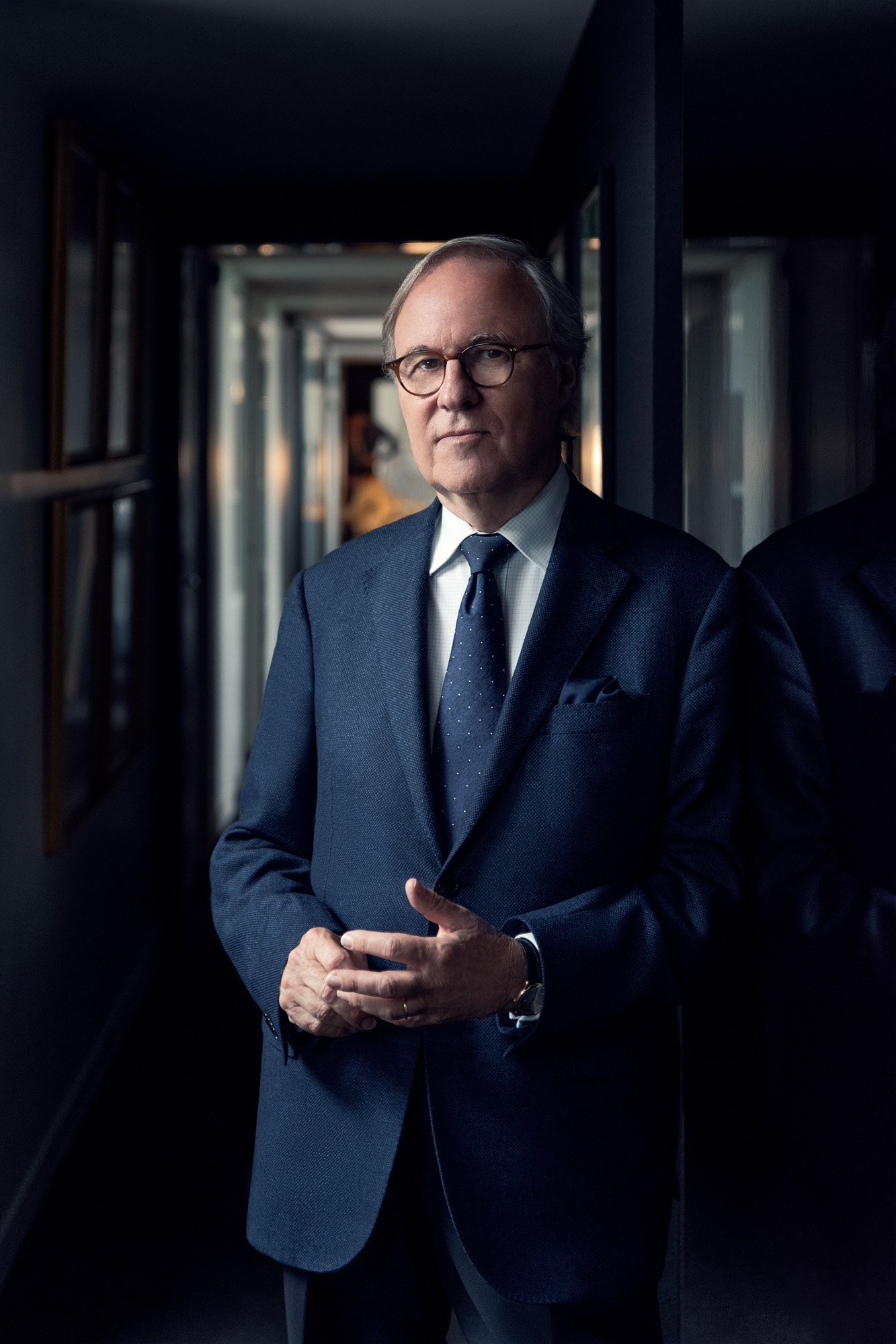 Interior Designer Pierre-Yves Rochon Standing in a Hallway