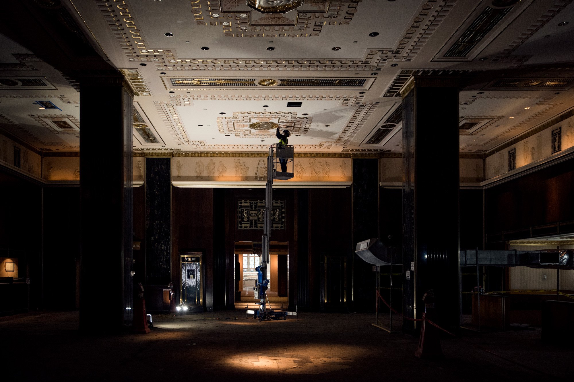 Construction Worker Restoring the Peacock Alley Ceiling in the Waldorf Astoria