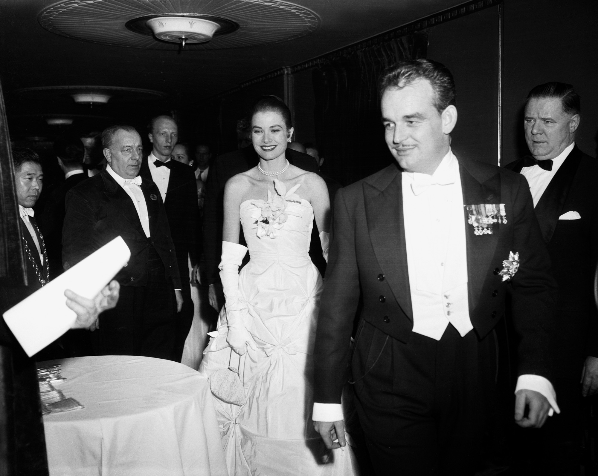 Prince Rainier III of Monaco with Grace Kelly at their Engagement Party