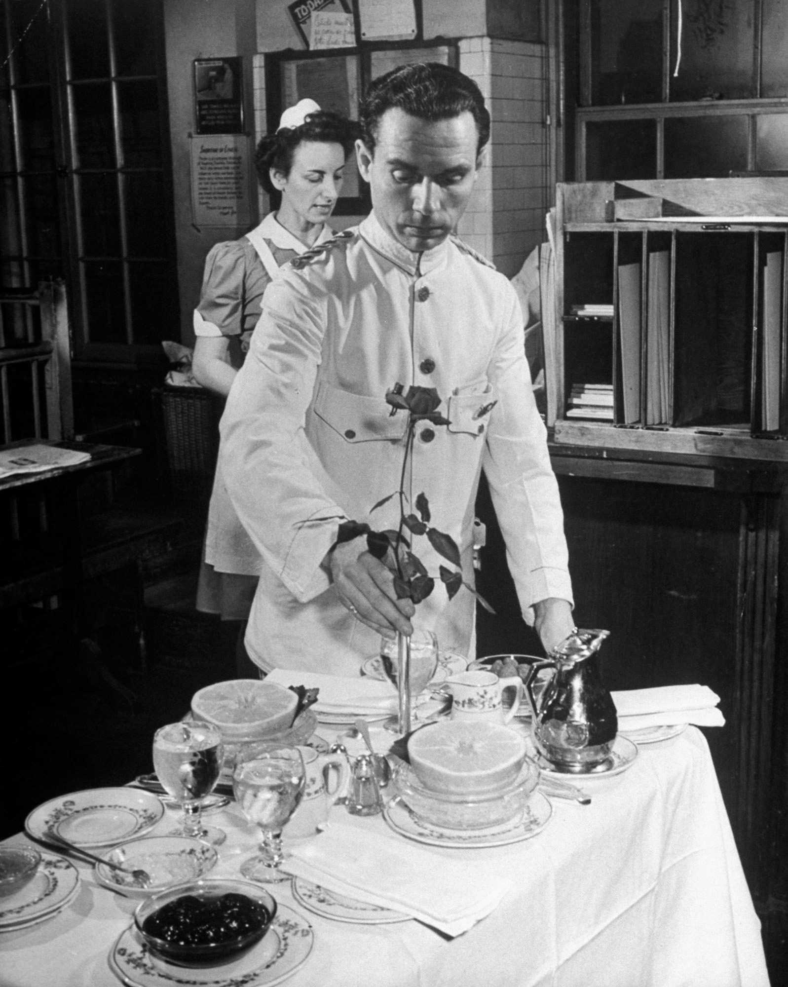 A Waiter Preparing to Deliver a Room Service Meal in 1931