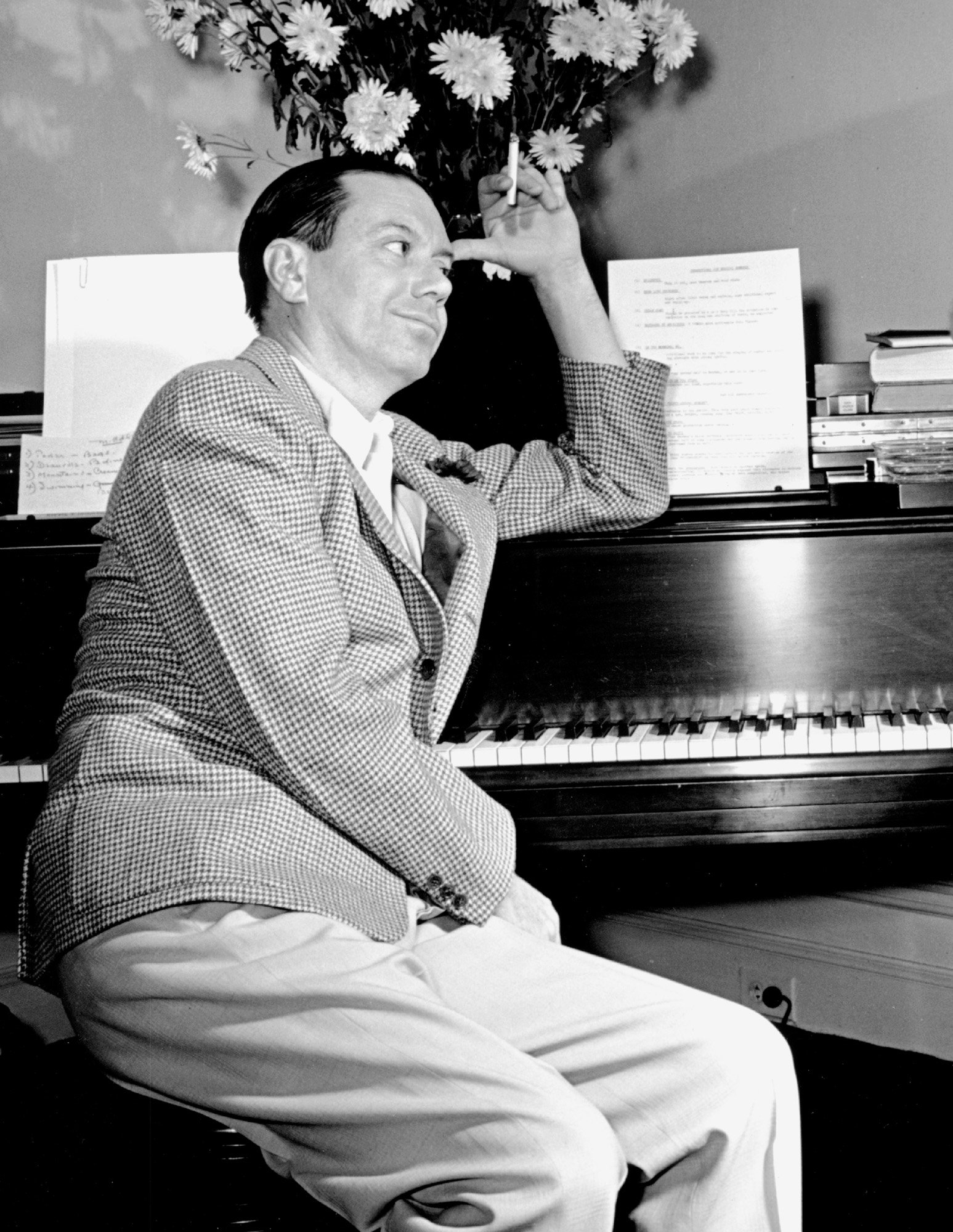 Cole Porter Leaning Against his Steinway Piano at his Waldorf Astoria Residence